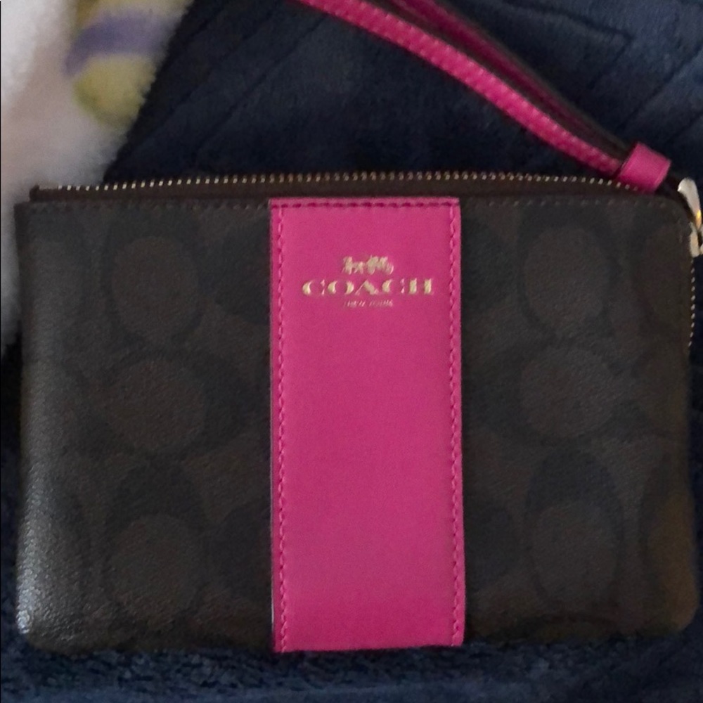 Coach wristlet perfect for a night out.